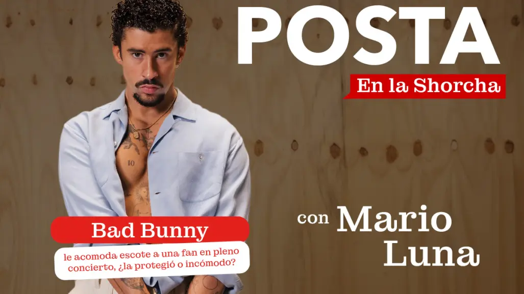 Bad Bunny le acomoda escote a una fan en pleno concierto