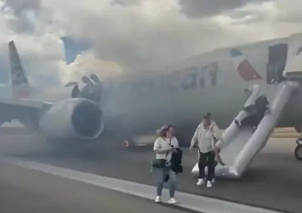Pasajeros evacuan avión de American Airlines tras incendio en rueda principal