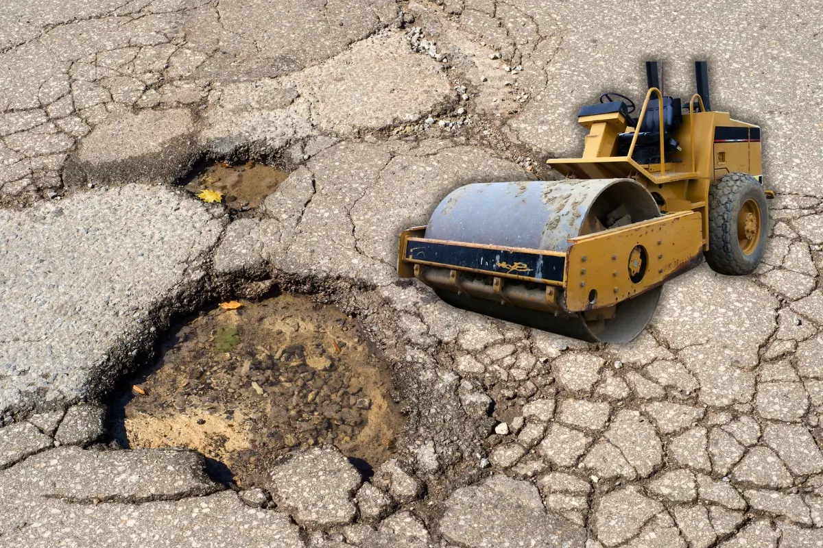 Ilustración de maquinaria frente a un bache.   Foto: Canva