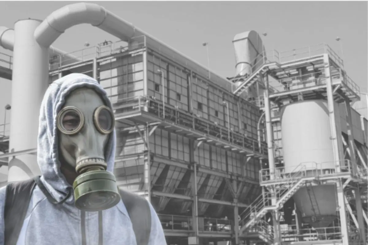 Imagen de fondo de la empresa Zinc Nacional con un hombre con mascarilla Foto: Canva