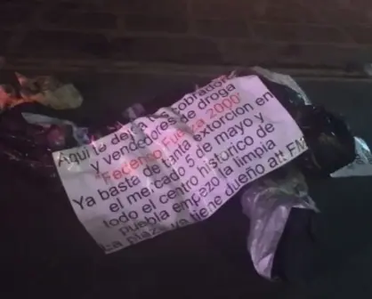 Con mensaje amenazante a líder ambulante, dejan 2 cuerpos emplayados en el Centro Histórico de Puebla