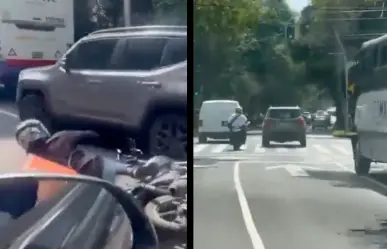 VIDEO | Lady Jeep atropella a repartidor en moto y se da a la fuja en Reforma CDMX
