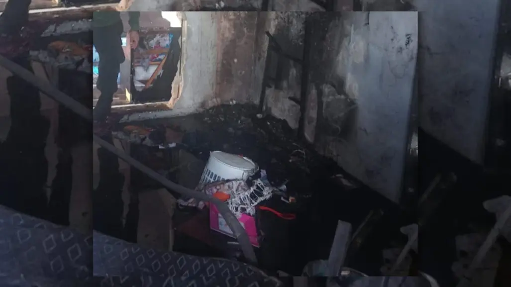 Incendio en Kanasín por un cortocircuito; rescatan a madre e hijo