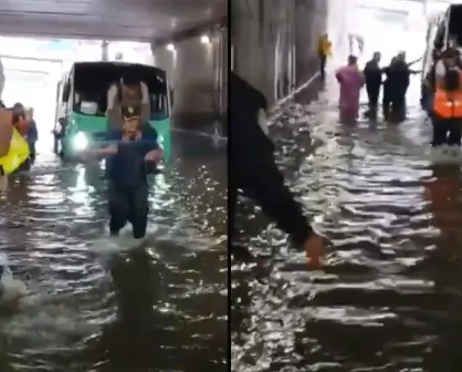 VIDEO | Policías de CDMX cargan a usuarios en caballito tras quedar atrapados por la lluvia