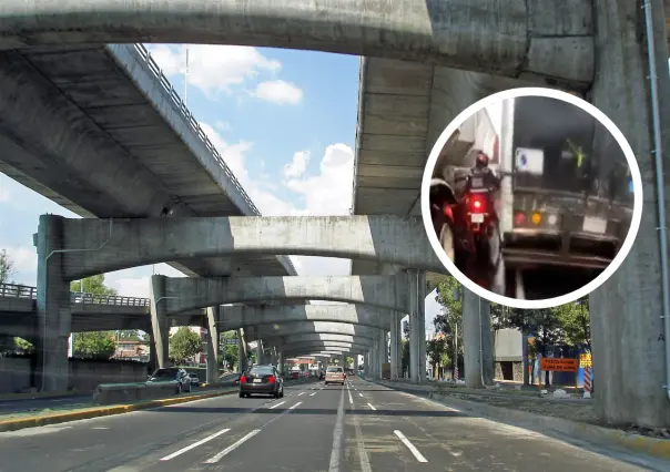 VIDEO | Motociclista es derribado al quedar atrapado entre dos camiones en periférico CDMX