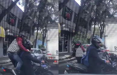VIDEO | Motociclistas armados asaltan a conductor en Colonia Roma y huyen por ciclovía de CDMX