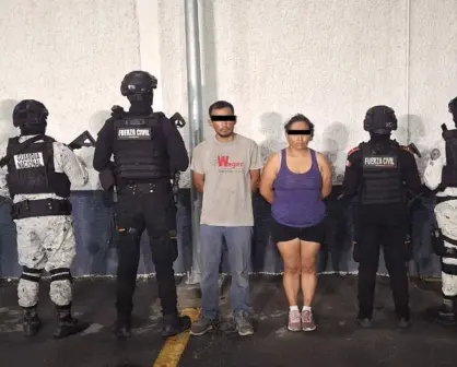 Cae pareja armada con arsenal en brecha de Linares, Nuevo León