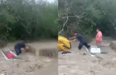 Rescatan a director de OOMSAPAS La Paz de camioneta atrapada en arroyo