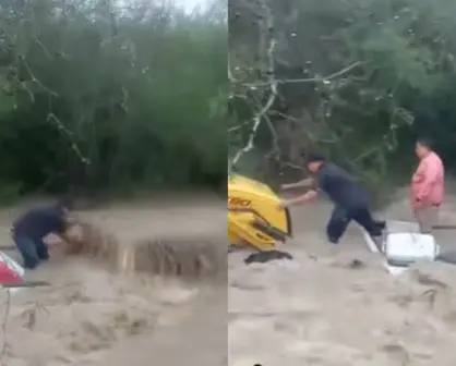 Rescatan a director de OOMSAPAS La Paz de camioneta atrapada en arroyo