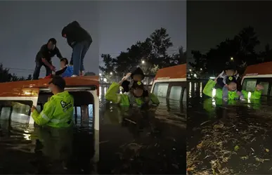 VIDEO | Policías de CDMX cargan personas atrapadas en una combi tras las intensas lluvias