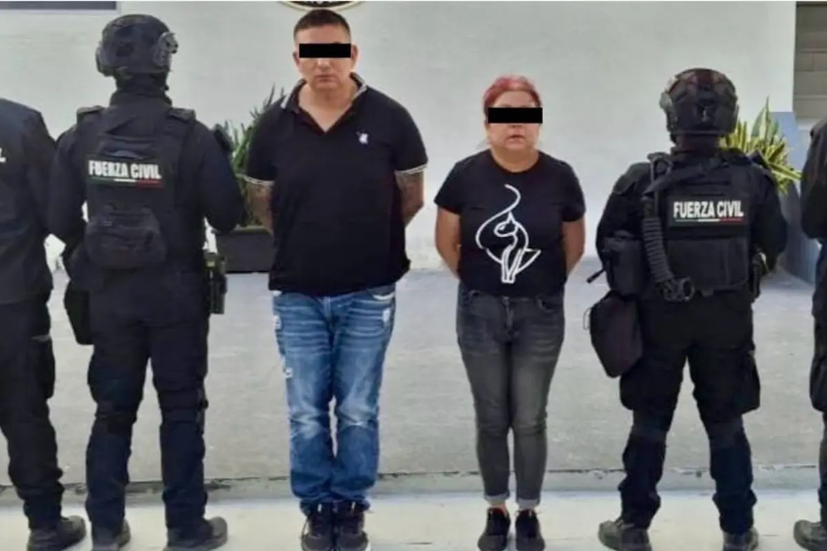 Un hombre y una mujer detenidos en el municipio de Juárez. Foto: Fuerza Civil