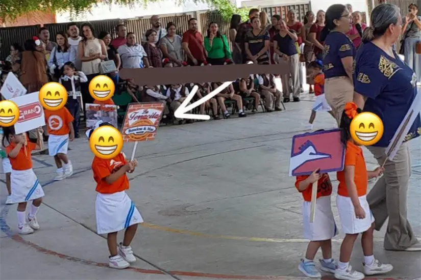 La alumna del jardín de niños portó un logo del negocio de La Terracita Boneless & Más en su tarea | Foto: FB
