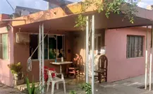 Operativo en Santiago: Fiscalía asegura armas y drogas en casa