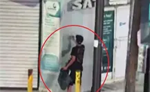 VIDEO | Hombre grafitea edificio del SAT y es detenido en el centro de Monterrey