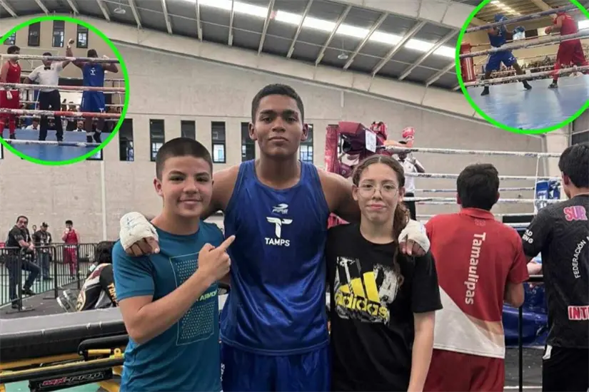 El campeón junto a sus compañeros de la escuela de box 