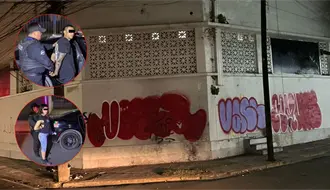 Detienen a pareja por grafitear barda en el centro de Monterrey