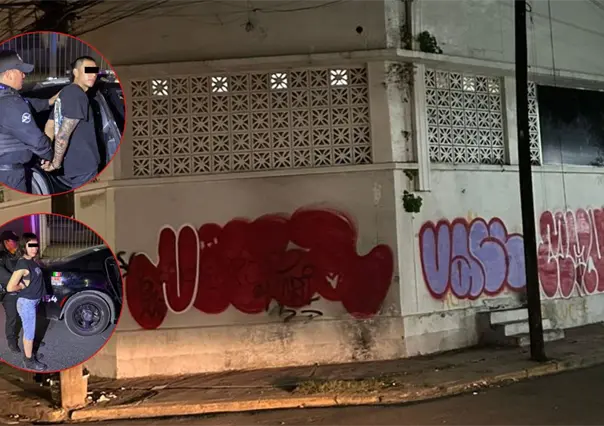 Detienen a pareja por grafitear barda en el centro de Monterrey