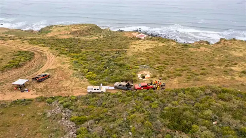 Vista aérea de la zona costera donde fueron localizados los cuerpos de los tres surfistas extranjeros. Foto:  Guillermo Arias / AFP