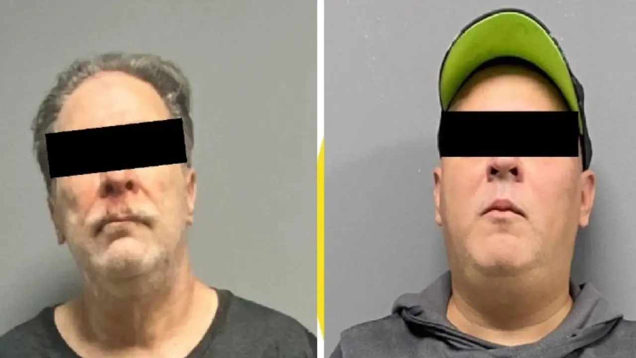 Los hombres detenidos por policías de Santiago luego de una pelea por un choque. Foto: Gobierno de Santiago