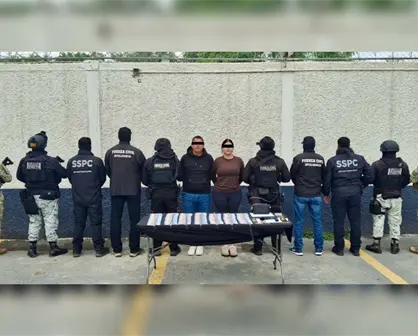 Detienen en Apodaca a pareja con armas, droga y más de 100 mil pesos