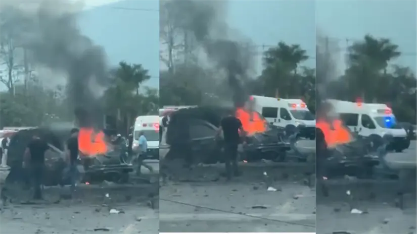 Rescate ayudando a lesionados en e ataque del coche bomba en Coyoacán , MIchoacán | FOTO: @Tipitapas)