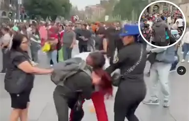 Violenta batalla campal entre comerciantes por espacios navideños en el Zócalo CDMX
