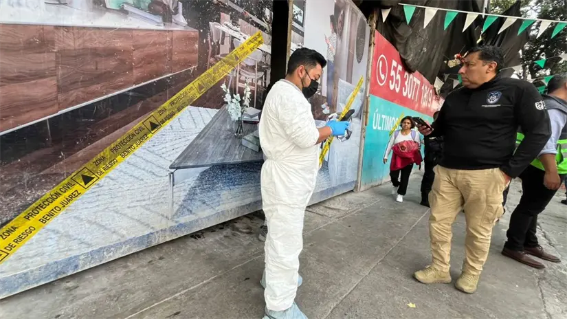 imagen recuadro Personal Forense y de la inmobiliaria en Benito Juárez. Foto: Luis Antonio Alfaro