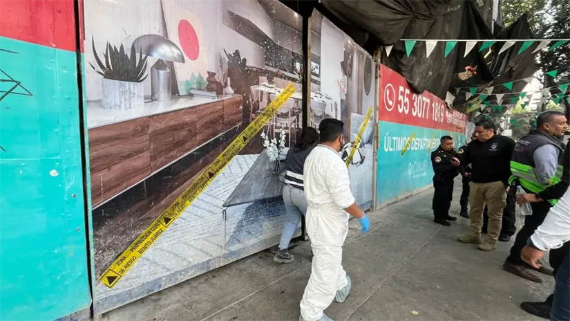 imagen recuadro Personal Forense y de la inmobiliaria en Benito Juárez. Foto: Luis Antonio Alfaro