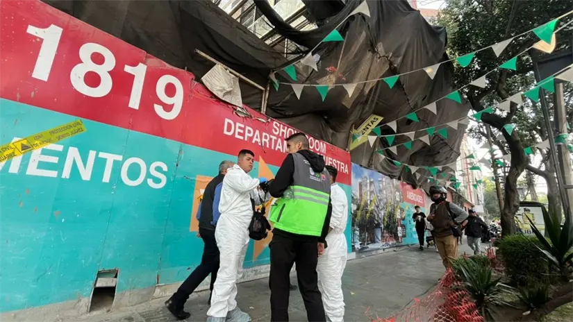 imagen recuadro Personal forense y de la inmobiliaria en alcaldía Benito Juárez. Foto: Luis Antonio Alfaro
