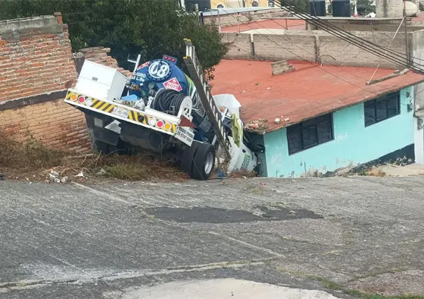 &iquest;Qui&eacute;n pagar&aacute; los da&ntilde;os a vivienda afectada tras el impacto de una pipa de gas en Edomex?