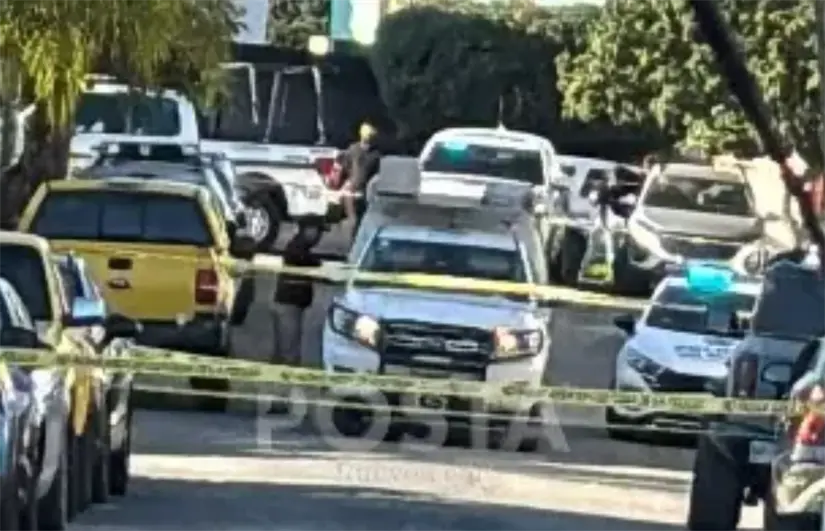 Elementos de la AEI en la zona donde fue ejecutado el abogado. Foto: POSTA